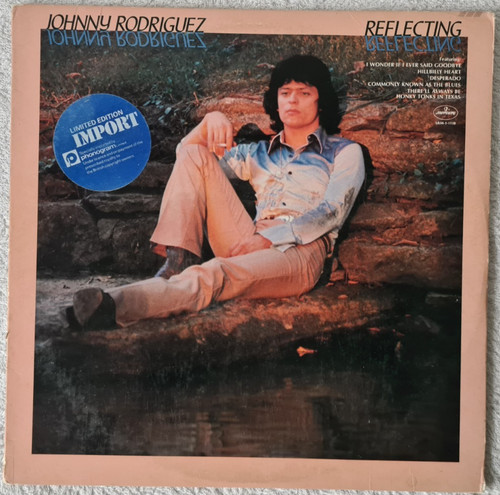 Johnny rodriguez reflecting - -,